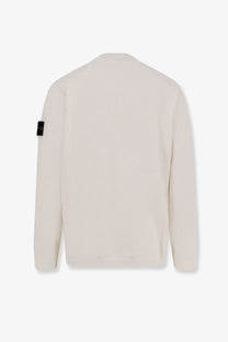 Stone Island men’s cream organic cotton knitted sweater with ribbed texture and black patch on left sleeve