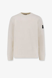 Stone island mens organic cotton cream ribbed knit sweater with black patch on left sleeve