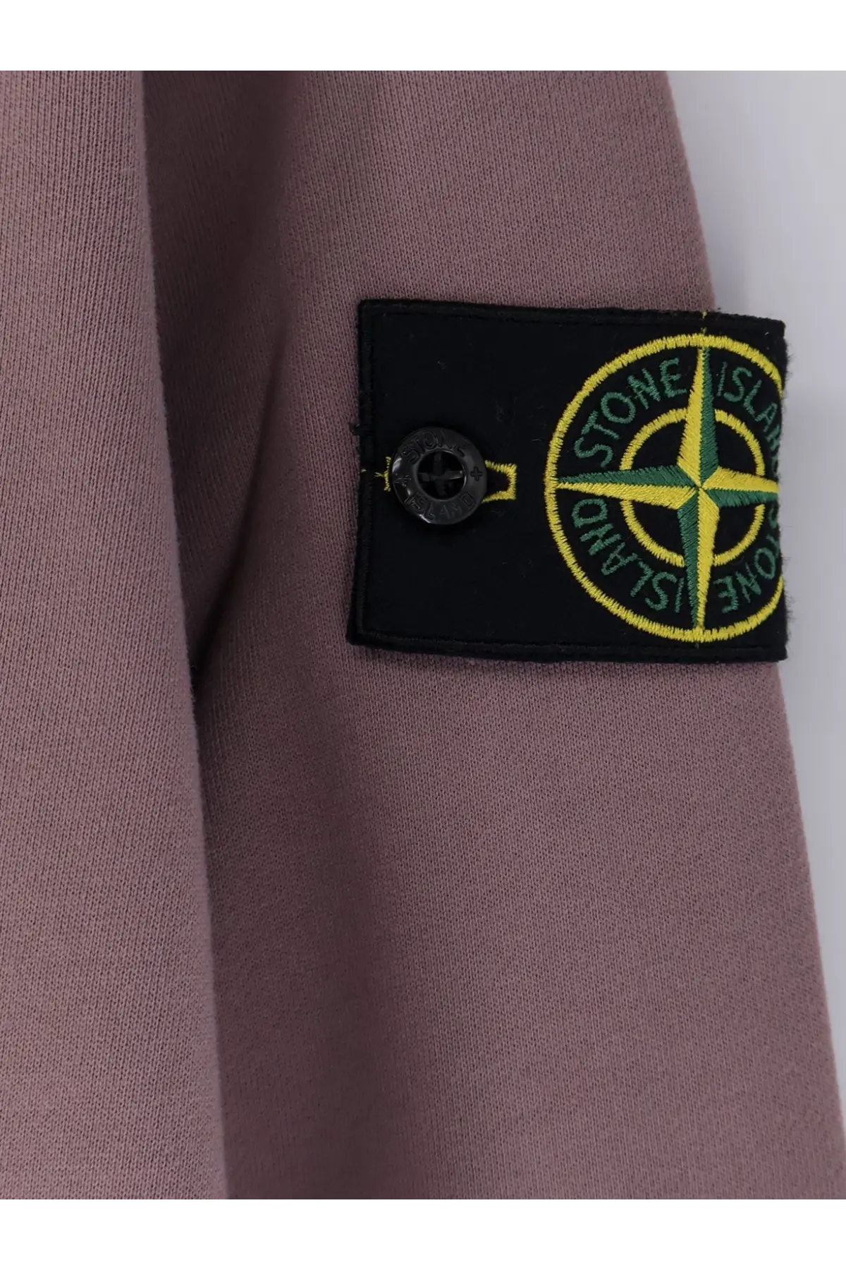 Stone island men’s organic cotton sweatshirt grey with black embroidered patch and yellow green compass rose on pink fabric