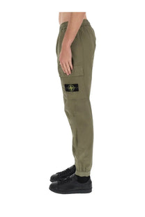 Stone Island men’s olive green cargo pants with black patch logo on thigh in parachute green color
