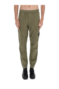 Stone Island men’s olive green cargo pants with elastic waistband side pockets and black logo patch on left thigh