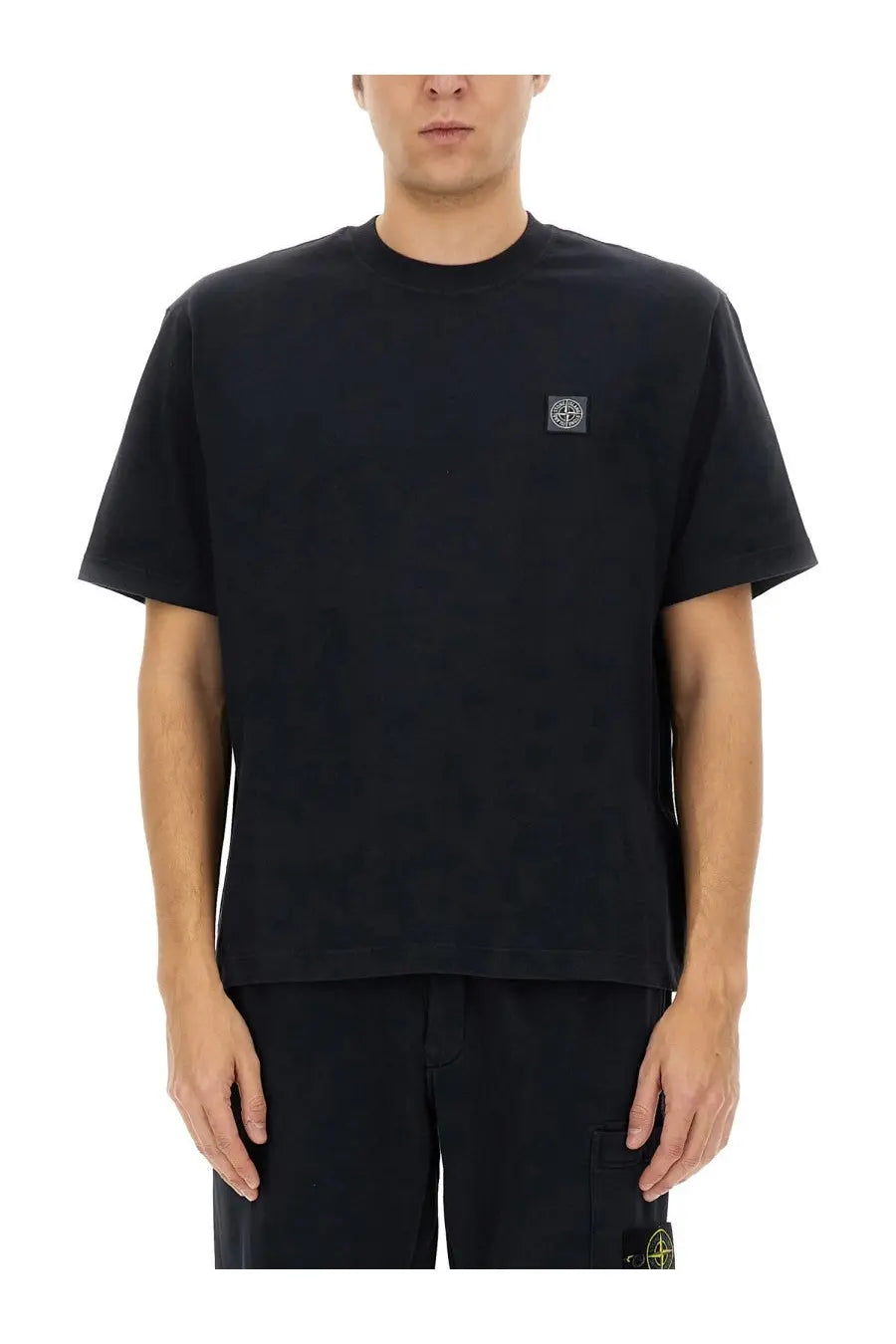 Stone island men’s black short-sleeved t-shirt with small square logo patch on left chest for casual wear