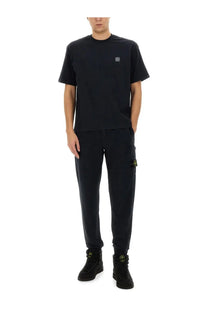 Stone island men’s black stone island t-shirt with small gray logo patch on the chest in cotton material