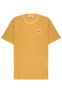 Stone Island men’s mustard yellow cotton t-shirt with small square logo patch on left chest and brand tag at neckline