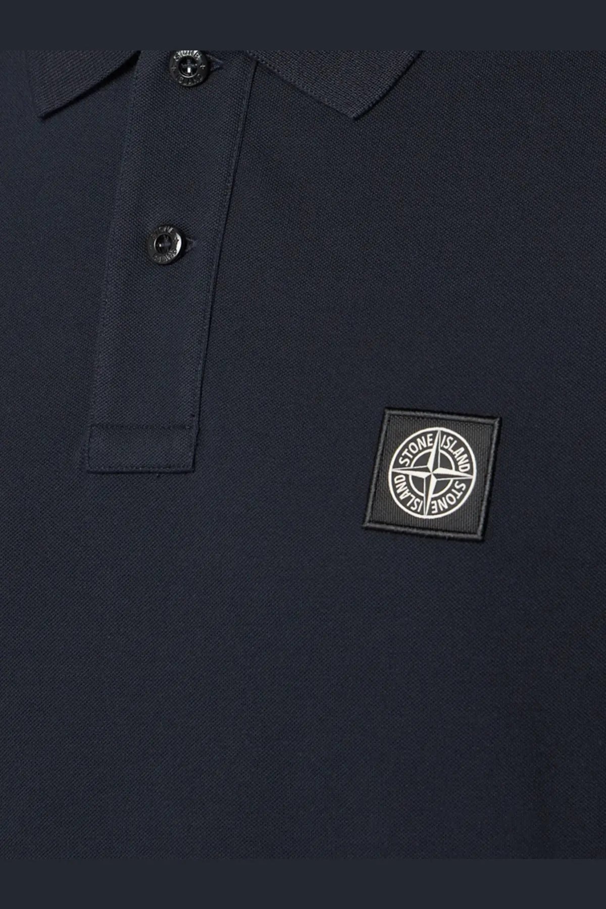 Stone Island men’s stretch organic cotton polo shirt in dark navy blue with black embroidered logo patch on the chest