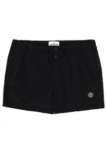 Stone Island men’s black swimsuit shorts with drawstring waist two front buttons and compass logo patch on lower right leg