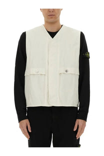 Stone Island men’s cream-colored minimalist utility vest with two front flap pockets and silver button closures
