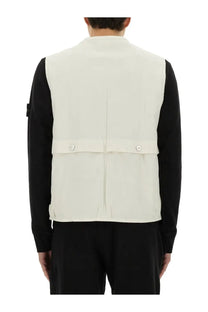 Stone Island men’s off-white sleeveless vest with high collar and two buttons worn over black long sleeve shirt