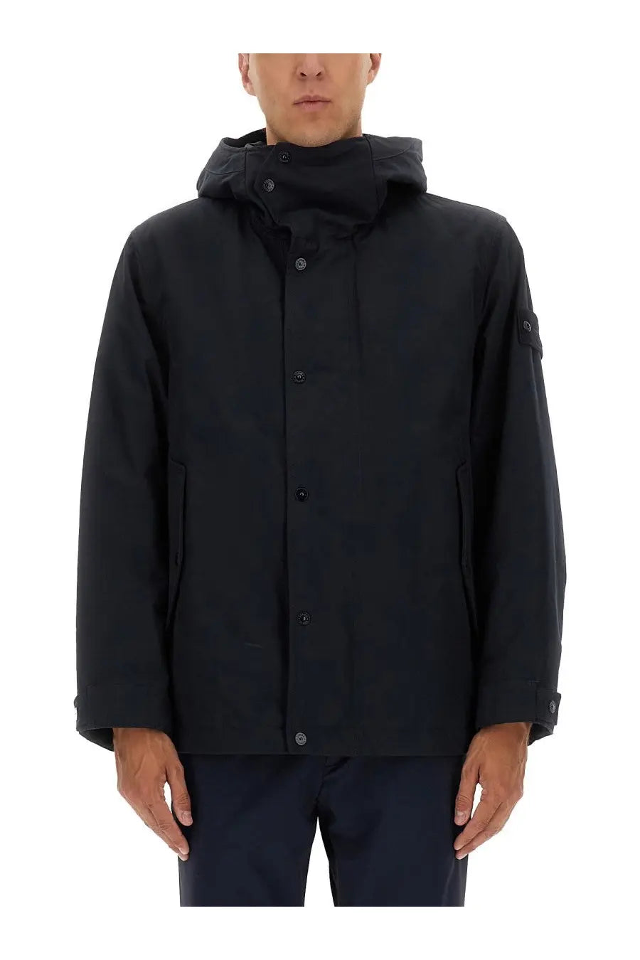 Stone island men’s waterproof blue jacket featuring a black hooded design with minimalist style and subtle button closures