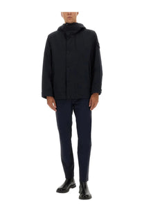 Stone island men’s waterproof black hooded jacket with sleek modern design and subtle sleeve branding