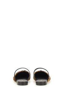 Stuart Weitzman women’s ballerina mule first bow leopard-print sandals with black leather straps and soles