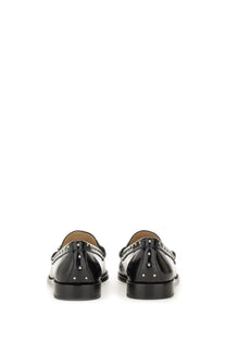 Stuart weitzman women’s moccasin lottie black patent leather loafers with silver studs and decorative chain detail back view