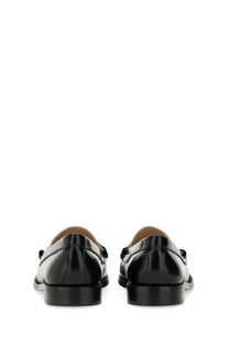 Stuart Weitzman women’s moccasin Lottie multicolor black patent leather loafers with glossy finish and classic design