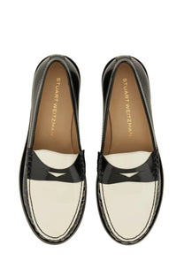Stuart Weitzman women’s moccasin Lottie multicolor black and white patent leather loafers with glossy finish and stitching