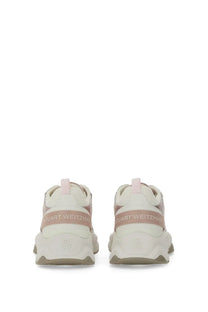 Stuart Weitzman women’s sneaker trainer in white and blush pink with chunky midsole and textured upper