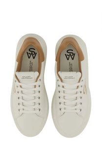 Stuart Weitzman women’s SW Pro sneaker white leather with tan accents and silver eyelets