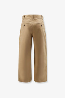Beige studio nicholson men’s chino cotton trousers with wide-leg tailored fit and subtle stitching details