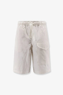 Beige cotton bermuda shorts with elastic waistband and single front pocket by studio nicholson men’s salt