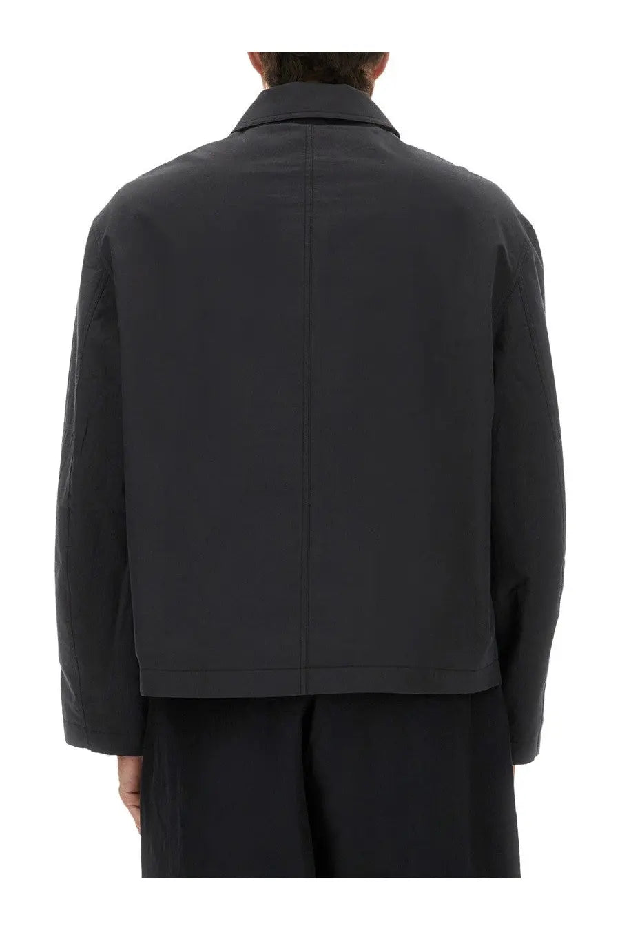 Studio Nicholson men’s Harrington jacket in black with minimalist design and structured collar