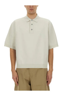 Studio Nicholson men’s knitted polo white in off-white with short sleeves classic collar and three matching buttons