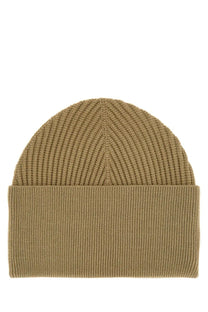 Studio Nicholson men’s Mikkel hat green ribbed knit beanie in tan with folded cuff made from soft material