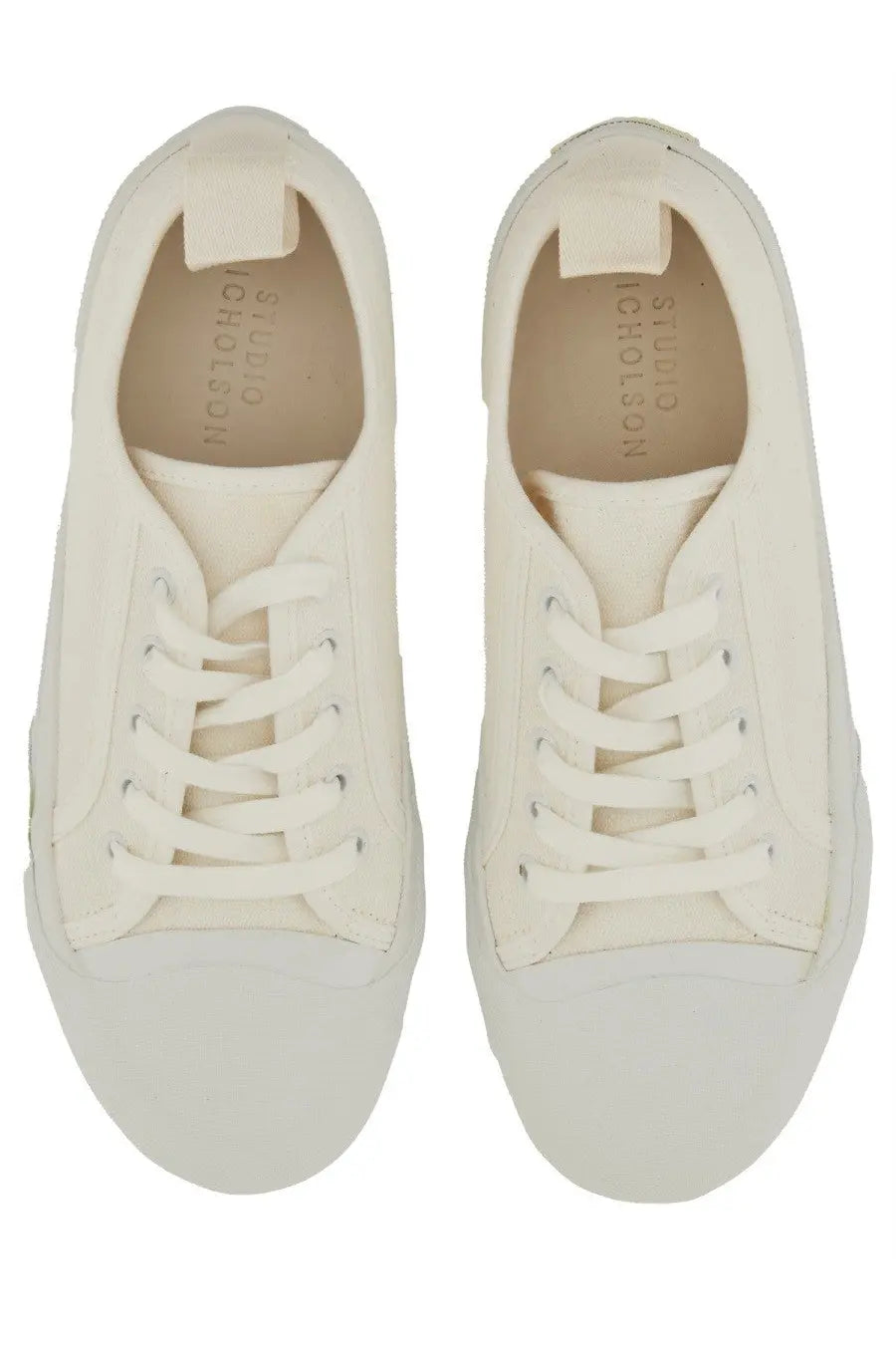 Studio nicholson men’s sneaker byrd white white canvas sneakers with matching laces and minimalist design