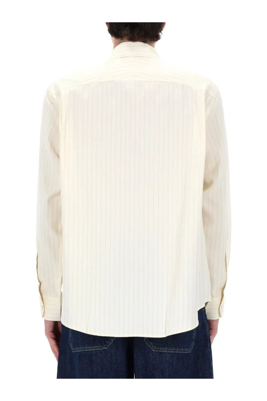 Studio nicholson men’s view shirt white is a cream-colored pleated cotton shirt with classic collar and long sleeves