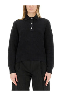 Studio nicholson women’s black ribbed knit polo sweater with silver buttons made from soft knit fabric