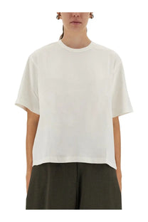 Studio Nicholson women’s white cotton shirt featuring a minimalist relaxed fit with subtle dropped shoulders