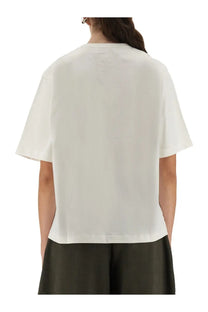Studio Nicholson women’s white cotton shirt loose fitting short sleeved with simple crew neckline visible from front