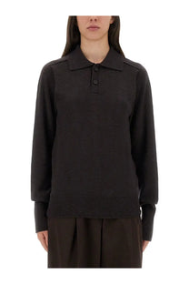 Black knit polo sweater with ribbed cuffs hem classic collar and two-button placket by Studio Nicholson