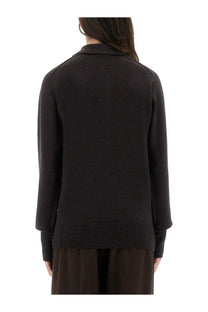 Black knitted cardigan with ribbed cuffs and hem shown from the back in studio nicholson women’s inverness shirt brown product