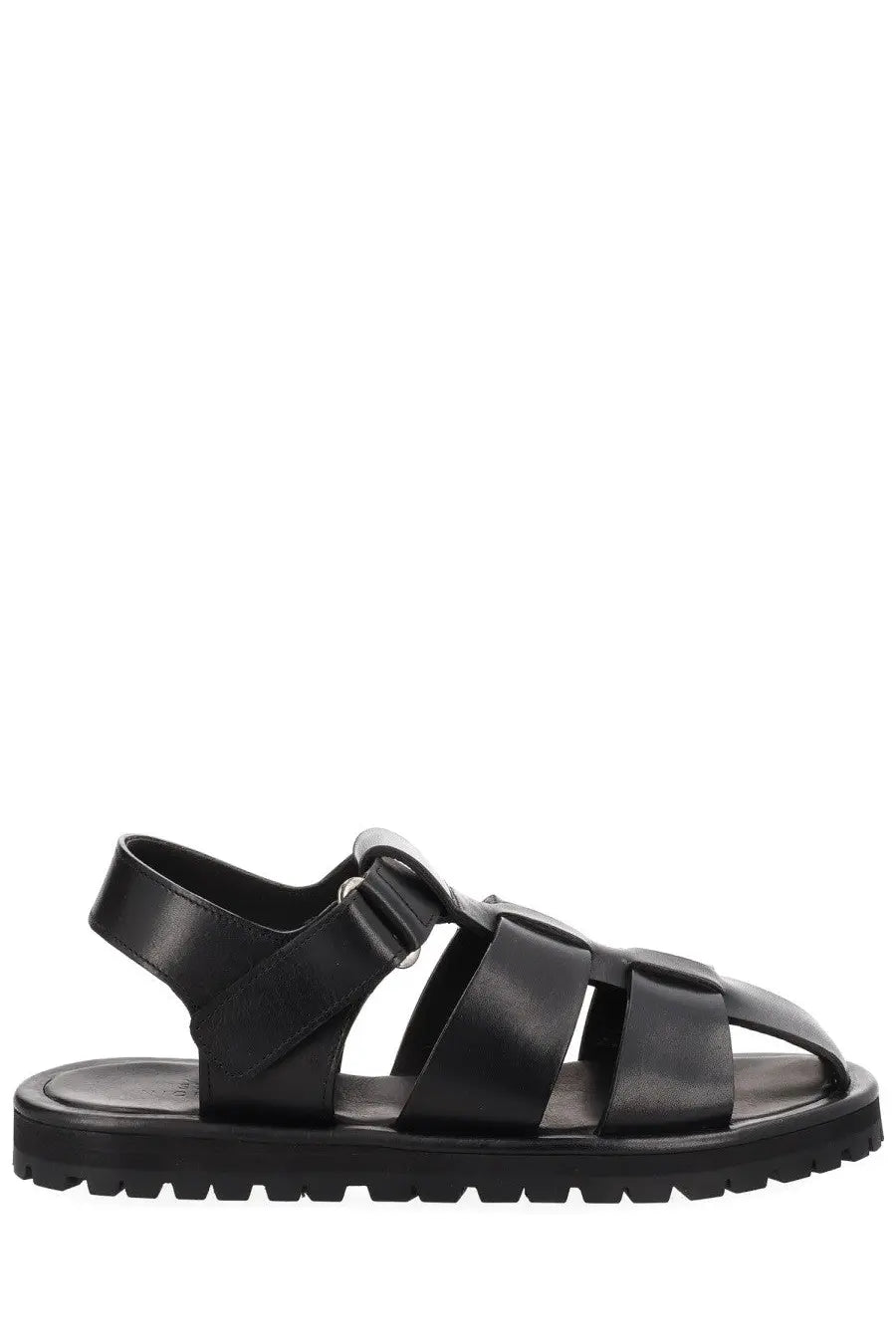 Studio nicholson women’s black leather sandal with chunky sole and adjustable strap shown from the back side