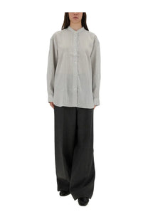 Studio Nicholson women’s shirt dilys white is a light gray vertically striped button-up with classic collar and long sleeves