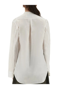 Studio nicholson women’s white button-down blouse with classic collar and subtle back pleating shown from the back