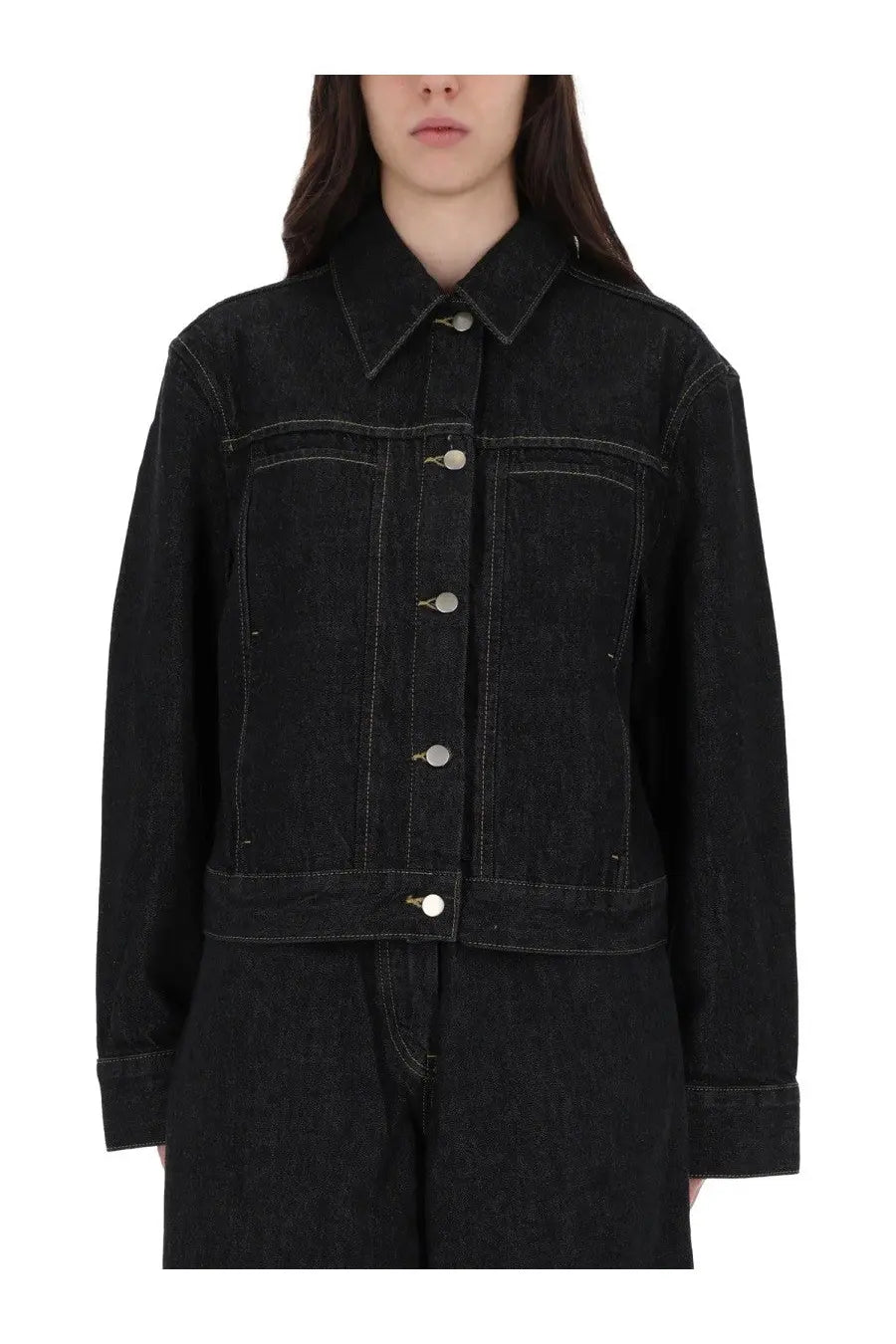 Studio Nicholson women’s Tahoe jacket black black denim with silver buttons and contrast stitching visible on front