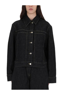 Studio Nicholson women’s Tahoe jacket black black denim with silver buttons and contrast stitching visible on front