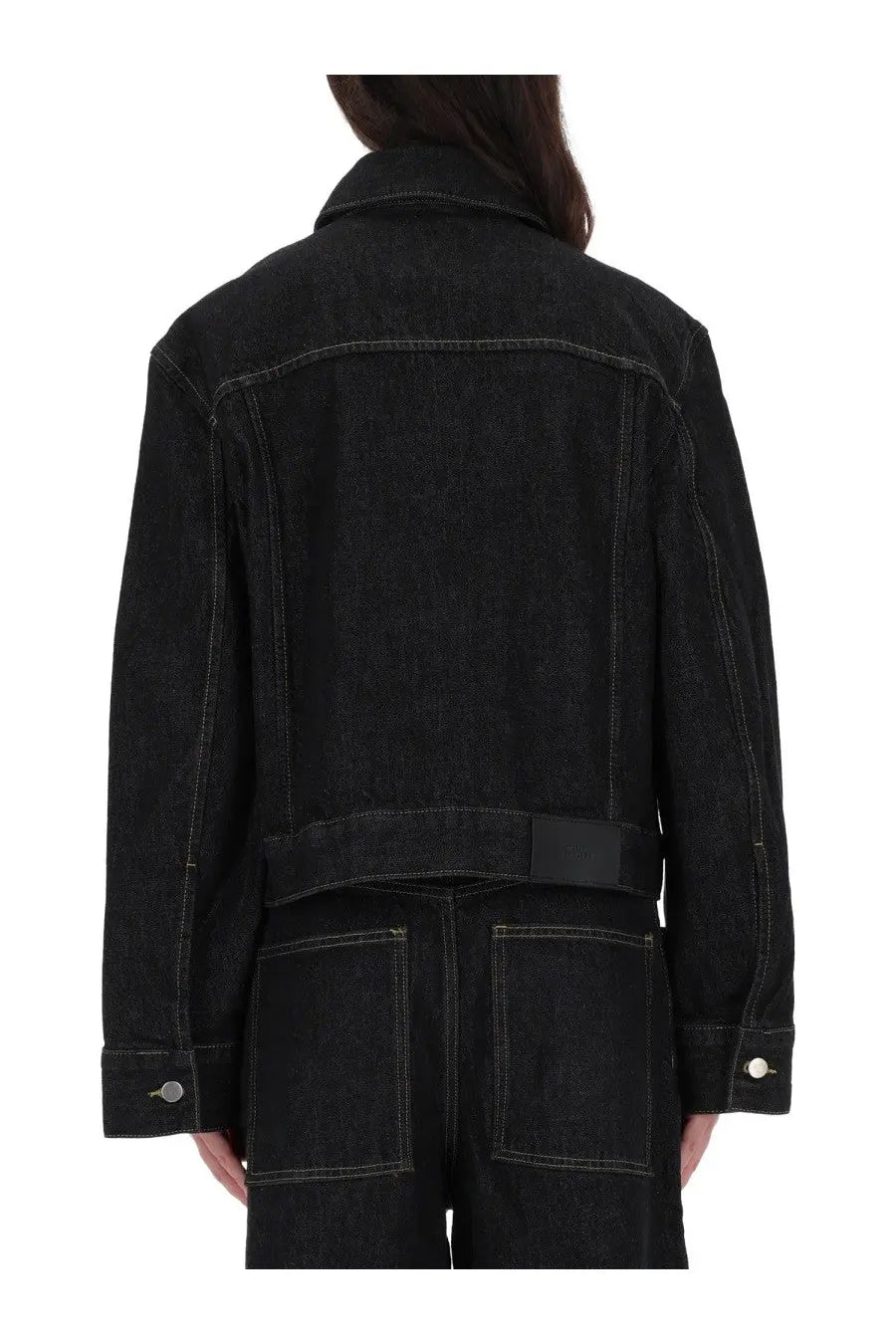 Studio nicholson women’s tahoe black denim jacket with contrasting white stitching and a black waist belt
