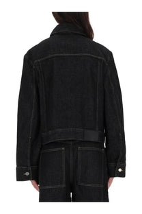 Studio nicholson women’s tahoe black denim jacket with contrasting white stitching and a black waist belt