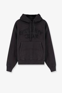 Black stussy men’s cotton blend hoodie with embossed logo and front pocket for casual wear