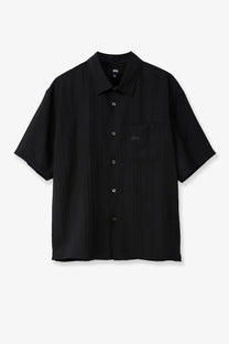 Stussy men’s black short-sleeved button-up shirt with subtle vertical ribbing made from lyocell and nylon blend