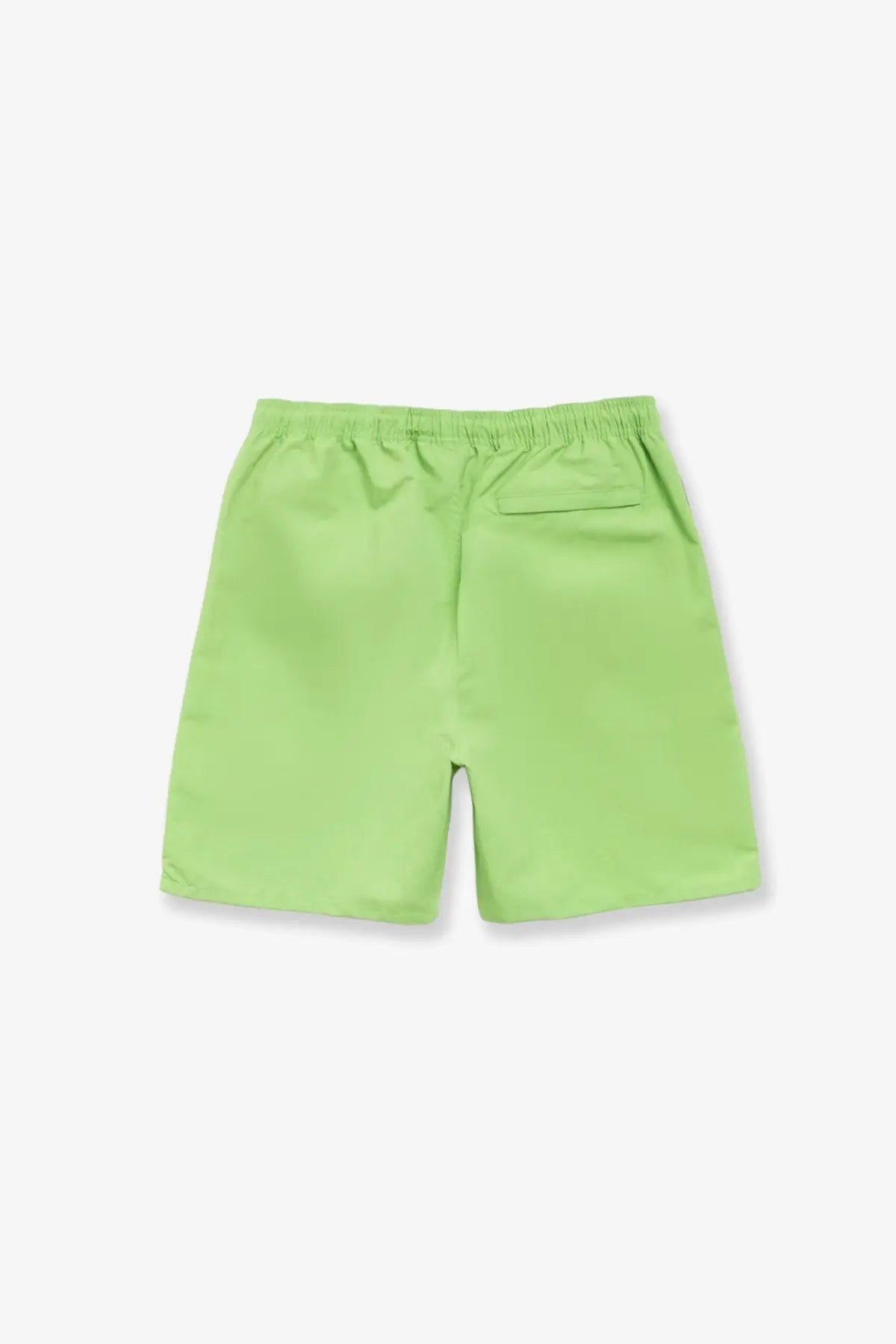 Bright lime green stussy men’s nylon swim trunks with elastic waistband and single back pocket shown from the back side