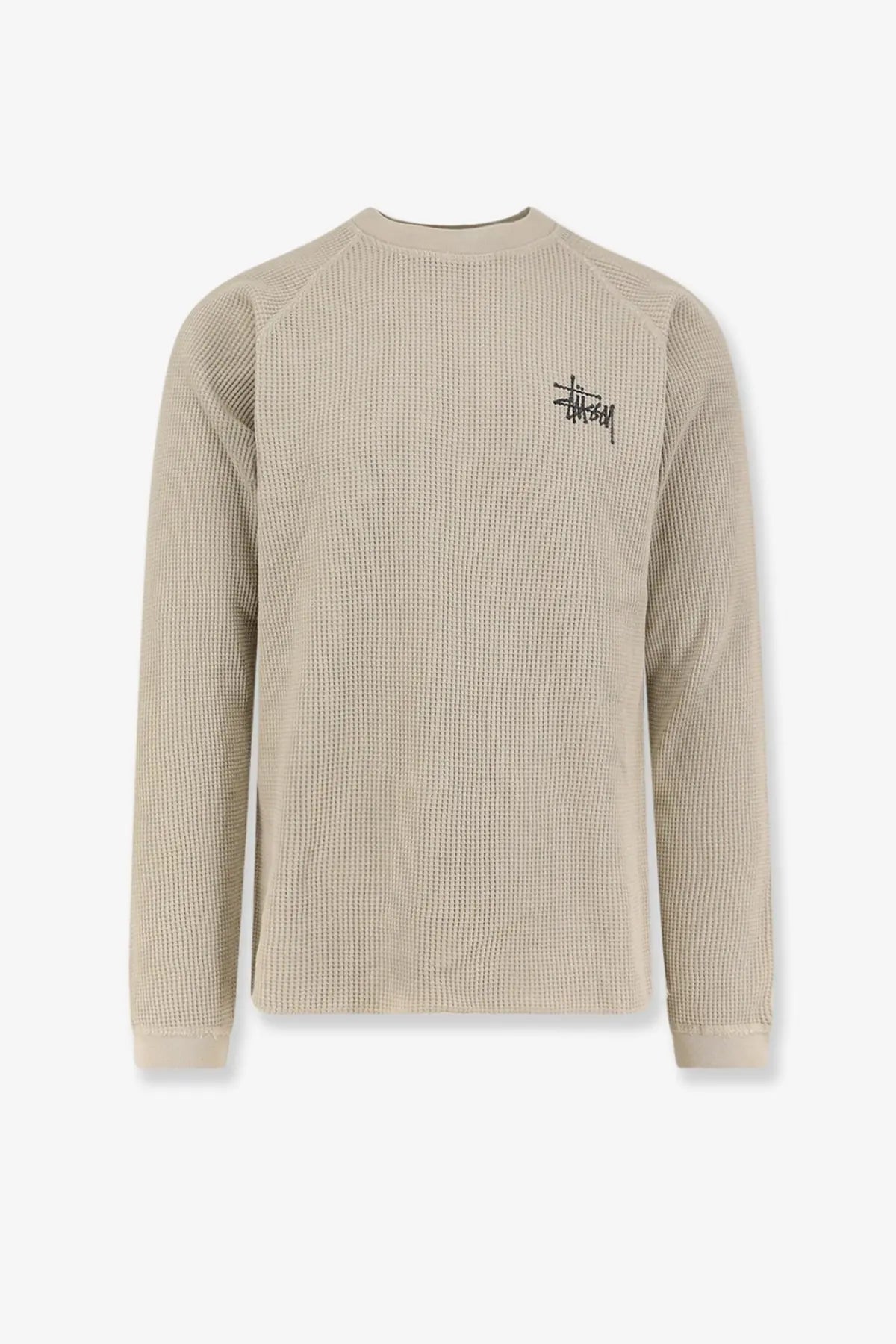 Beige waffle knit cotton long sleeve crewneck sweater with black embroidered Stussy logo on left chest bone color