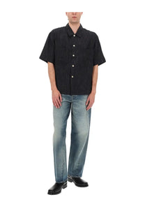 Black short-sleeved button-up shirt with fine vertical stripes paired with sunflower men’s jeans wide twist blue