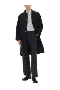 Black men’s relaxed trench coat with button closures and classic collar from sunflower collection