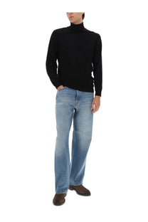 Black turtleneck sweater with long sleeves and ribbed collar paired with sunflower men’s wide twist jeans blue