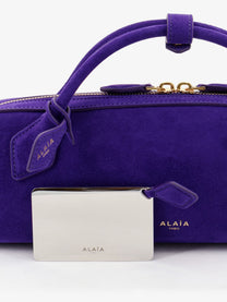 ALAÏA Women's Teckel Clutch Suede Handbag Iris