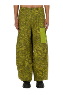 Ten c men’s olive green camouflage wide-leg cargo pants with lime green side pocket patch from awake ny