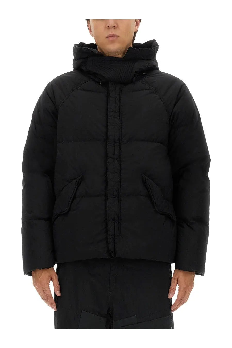 Ten c men’s down jacket in artic black featuring a black quilted puffer design with hood for cold weather use
