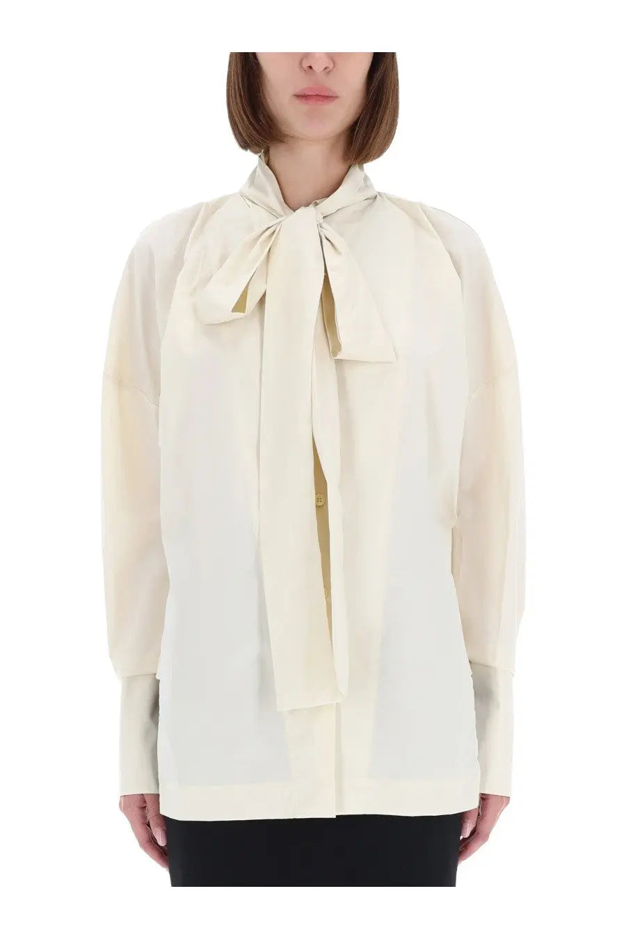 Thelatest women’s shirt cecilia yellow cream-colored silk blouse with a prominent bow at the neckline